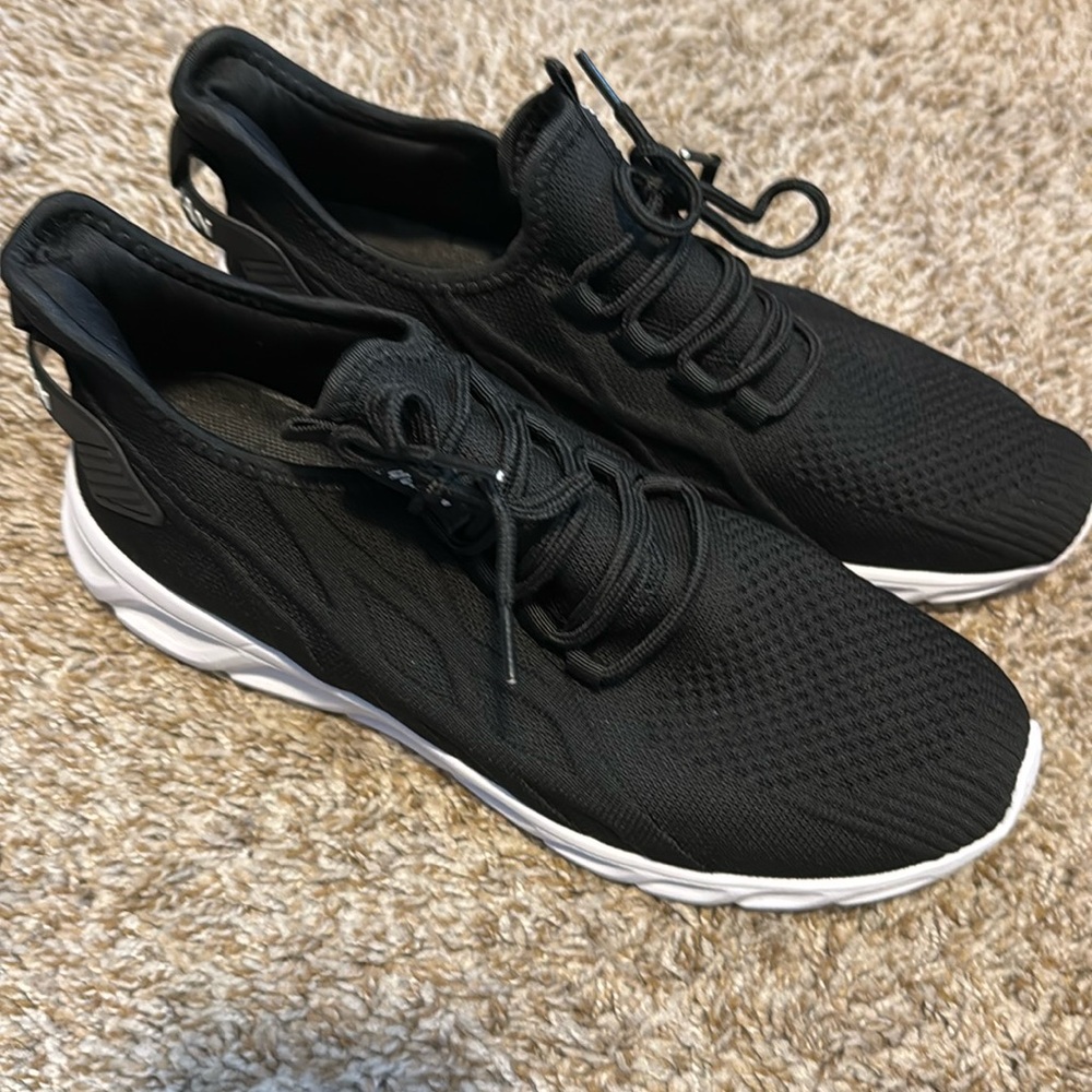 New size 11, black-and-white tennis shoes